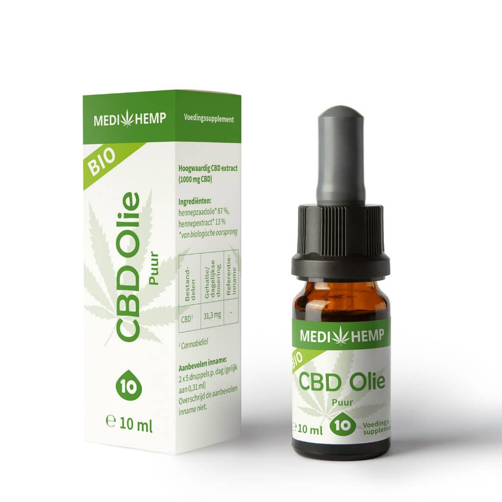 a bottle of cbd oil next to a box of cbd oil.