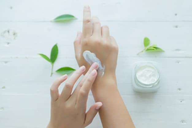 a woman's hands holding a jar of cream.