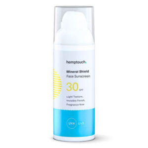 A bottle of Hemptouch Mineral Shield Face Sunscreen SPF 30 with UVA and UVB protection. The label states it has a light texture, invisible finish, and is fragrance-free.
