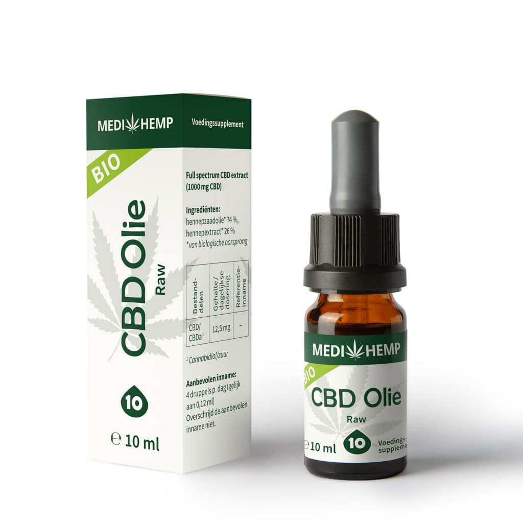 a bottle of cbd oil next to a box of cbd oil.