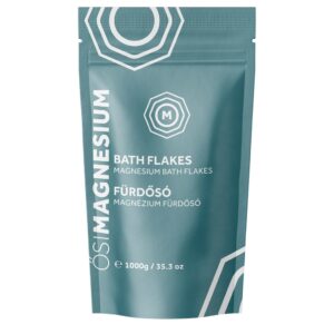 A teal pouch labeled "OsiMagnesium - Good Mood Magnesium Bath Flakes - Sweet Orange (1kg)" containing magnesium bath flakes, weighing 1000g (35.3 oz). Text is in English and Hungarian. The logo and design are in white.