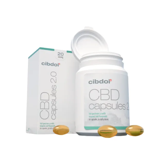 Cibdol 5% CBD softgels capsules bottle and box with three capsules visible in the foreground.