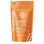 A 1000g orange bag of OsiMagnesium - Good Mood Magnesium Bath Flakes - Sweet Orange (1kg), labeled in English and Hungarian.