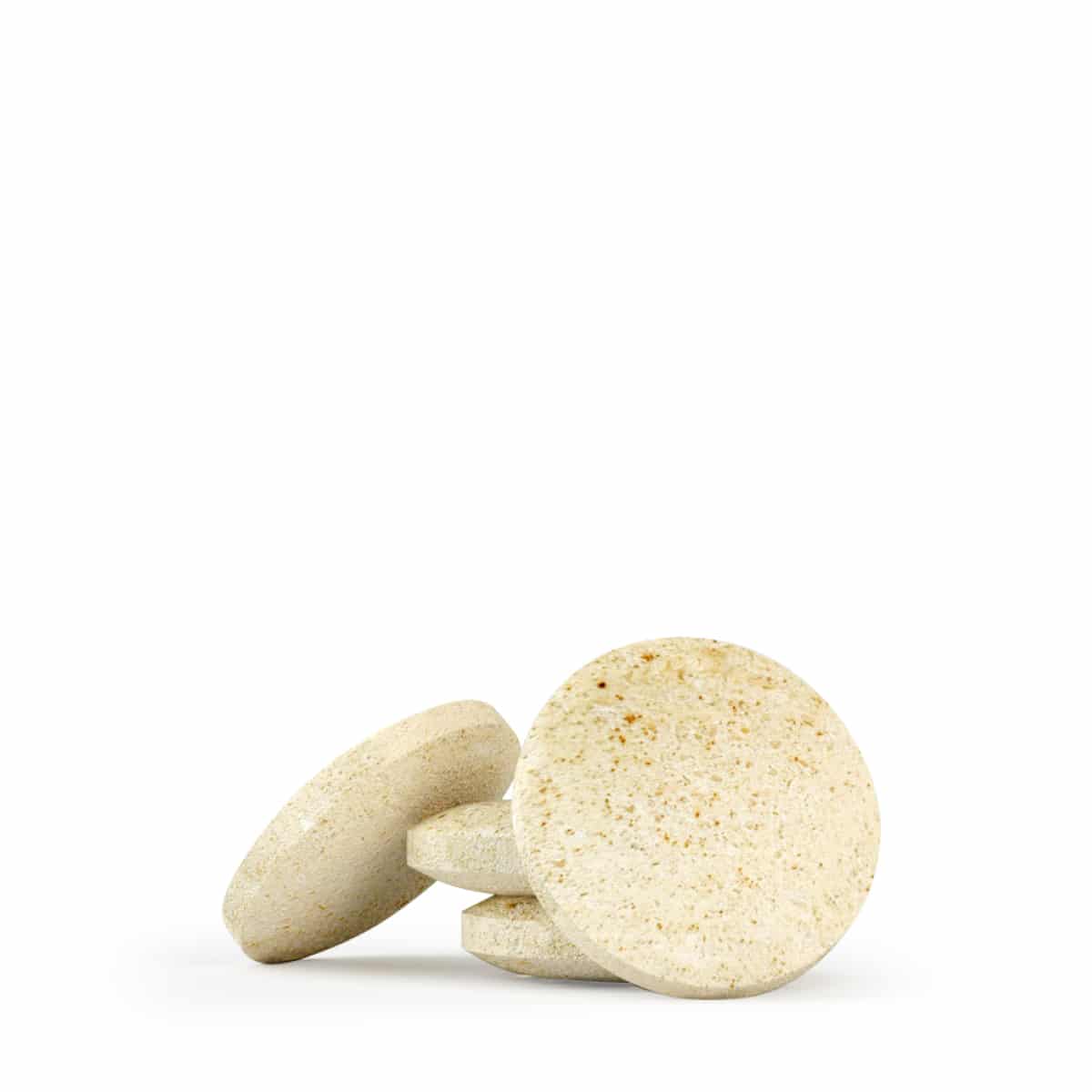 a close up of two CBD pastilles for dogs (3,2mg) on a white background.